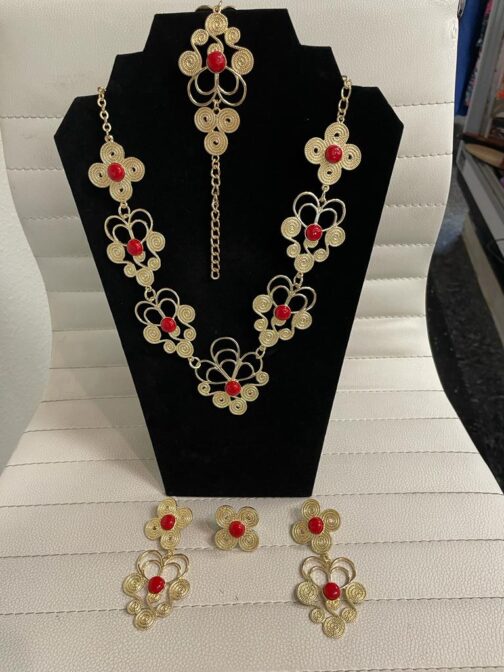 Women 4 pc gold color with red stones